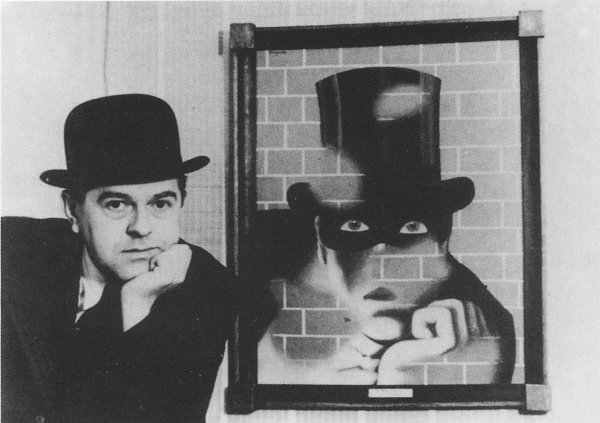 Fig. 3 - René Magritte photographié en 1938 devant son tableau Le barbare © Photothèque R. Magritte - Adagp, Paris 2008